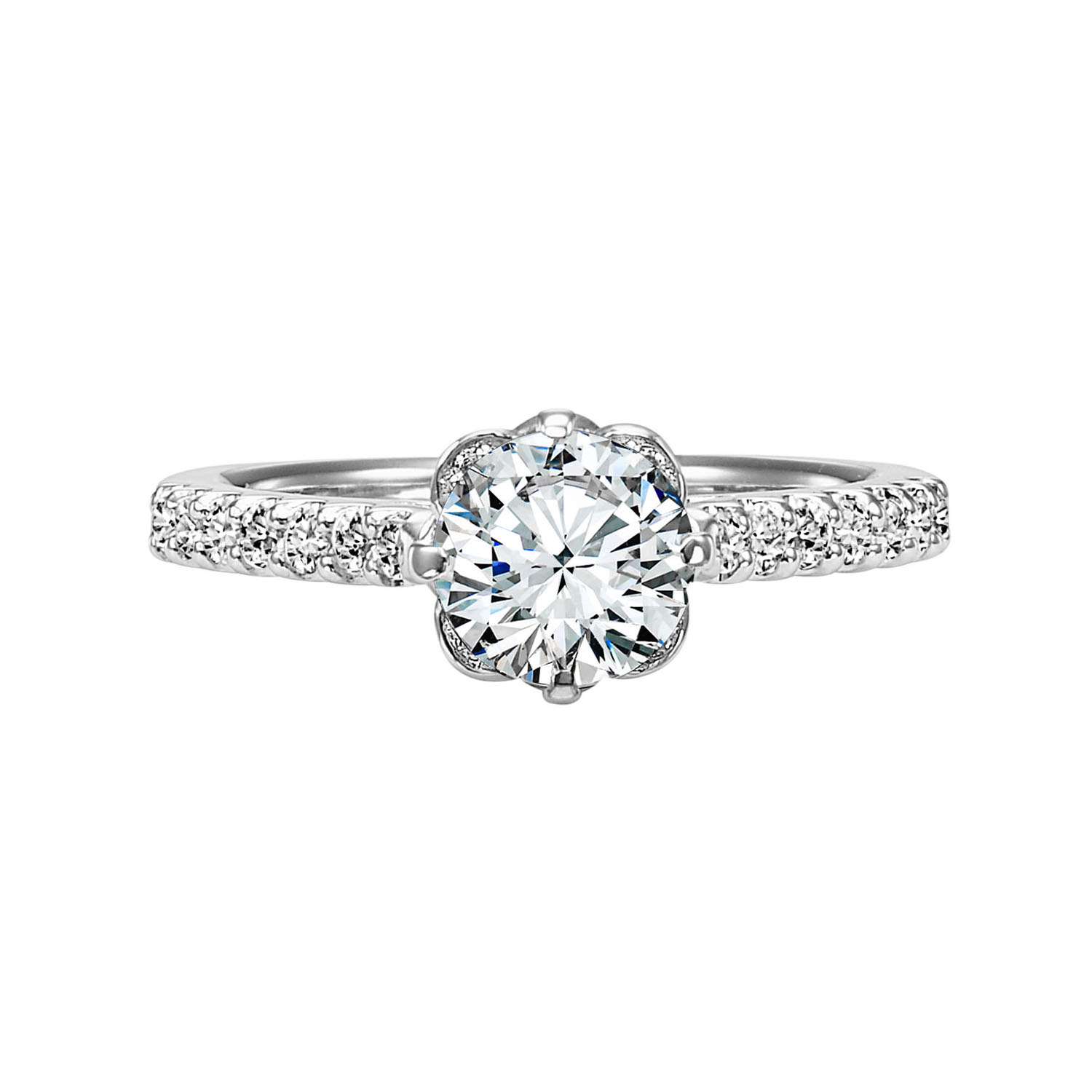 Romantic and enchanting, this engagement ring features a beautiful petite diamond crown accentuating thr center stone and diamond shared prong band