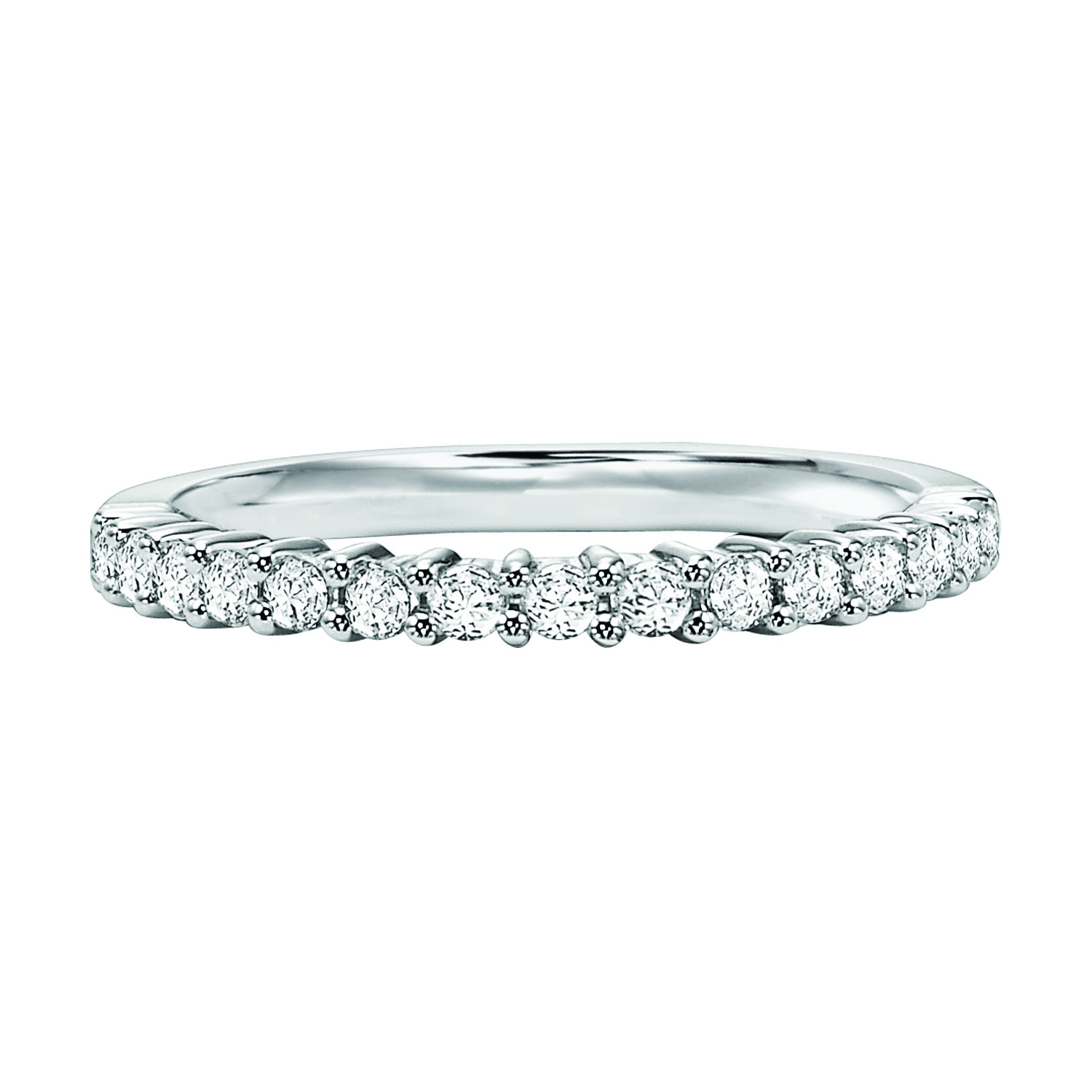 Wedding band with round, prong set diamonds halfway around.