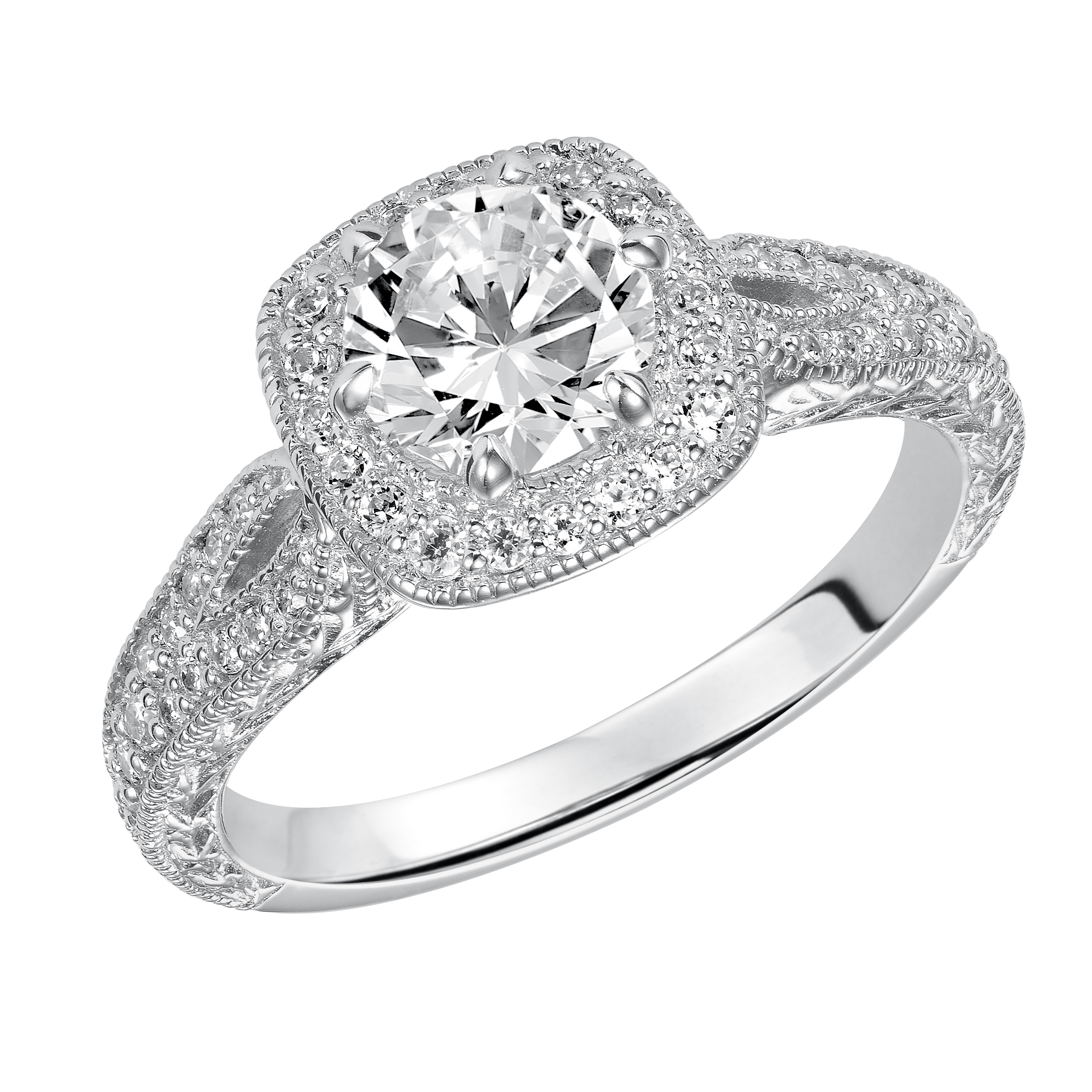 Modern meets vintage with this beloved engagement ring featuring a stunning prong set diamond halo and band with milgrain details and an engraved design