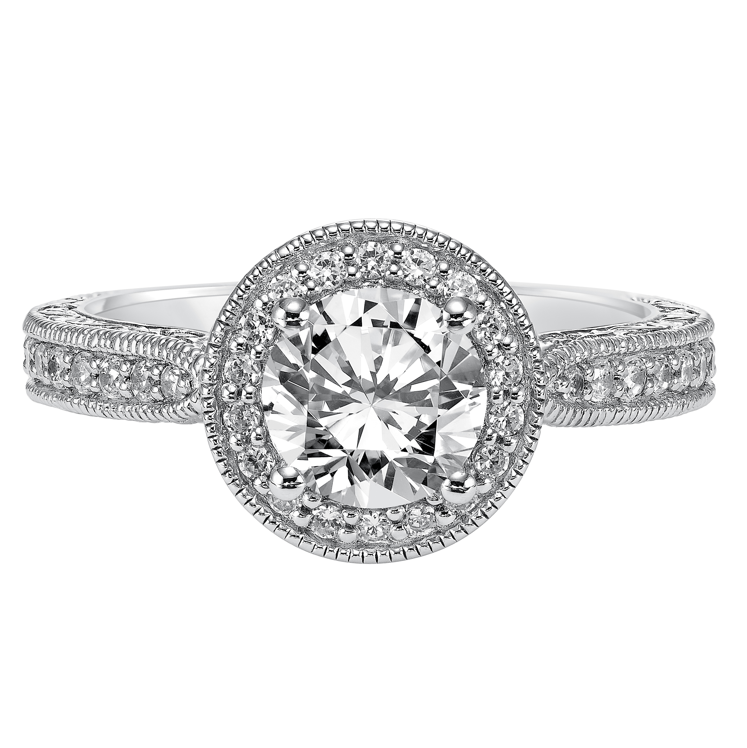 This round diamond engagement ring featuring a prong set diamond halo and band with engraving and milgrain is vintage chic, beautiful and sure to make a statement