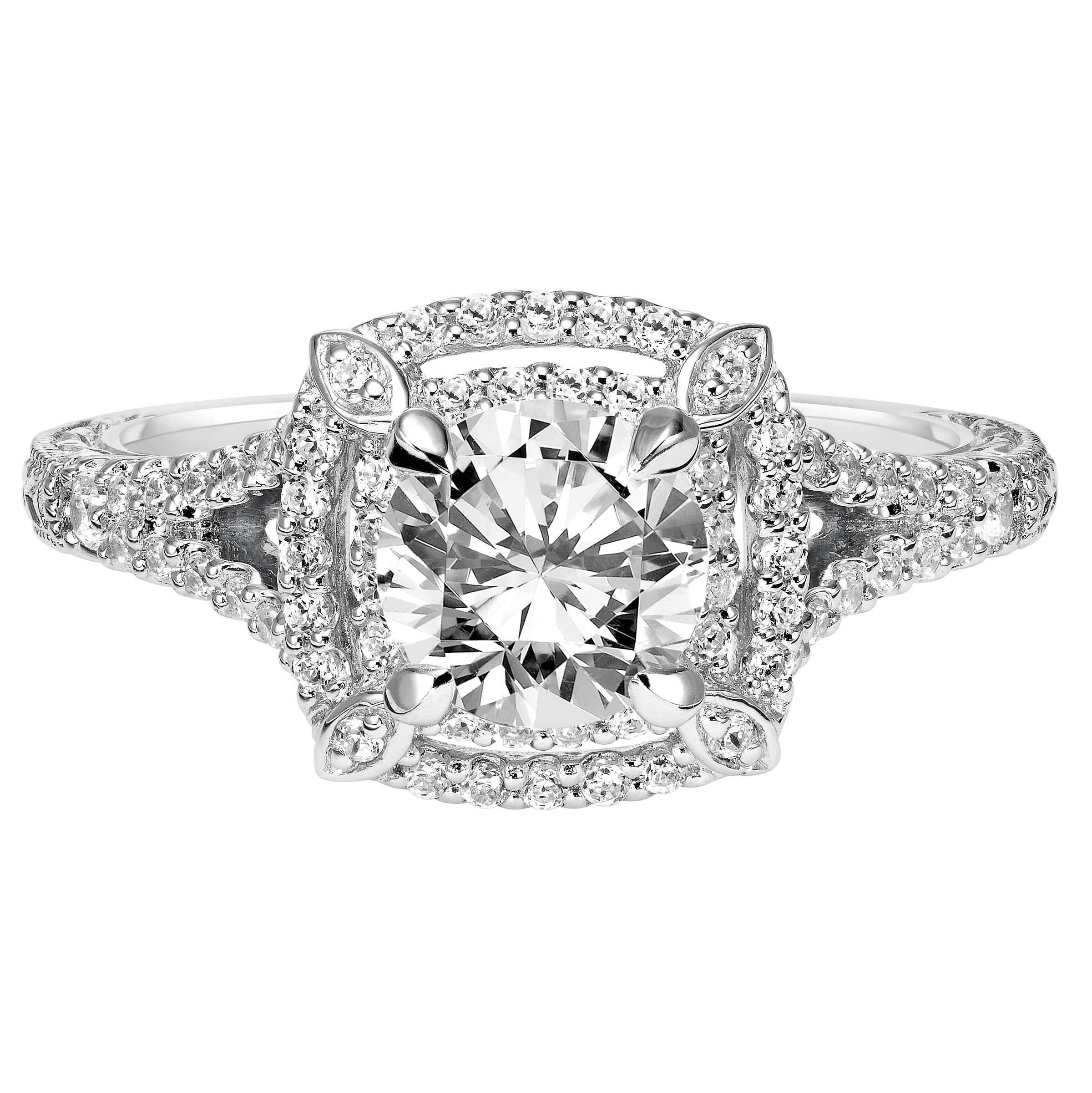 Magnificent from all angles, this show-stopping engagement ring features a prong set diamond double halo with delicate engraving and milgrain on the band