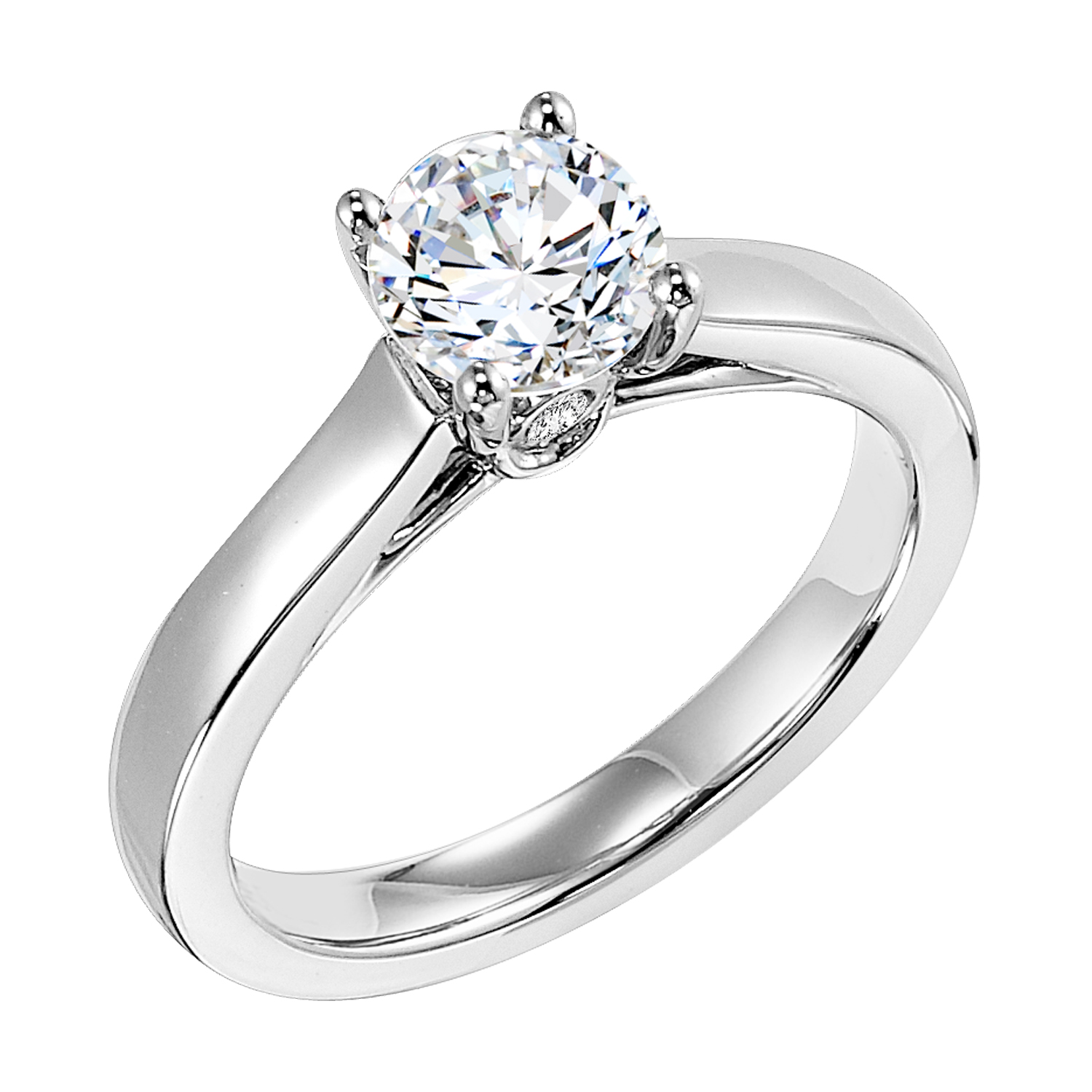 This alluring solitaire engagement ring features a 4-prong setting and beautiful surprise diamond