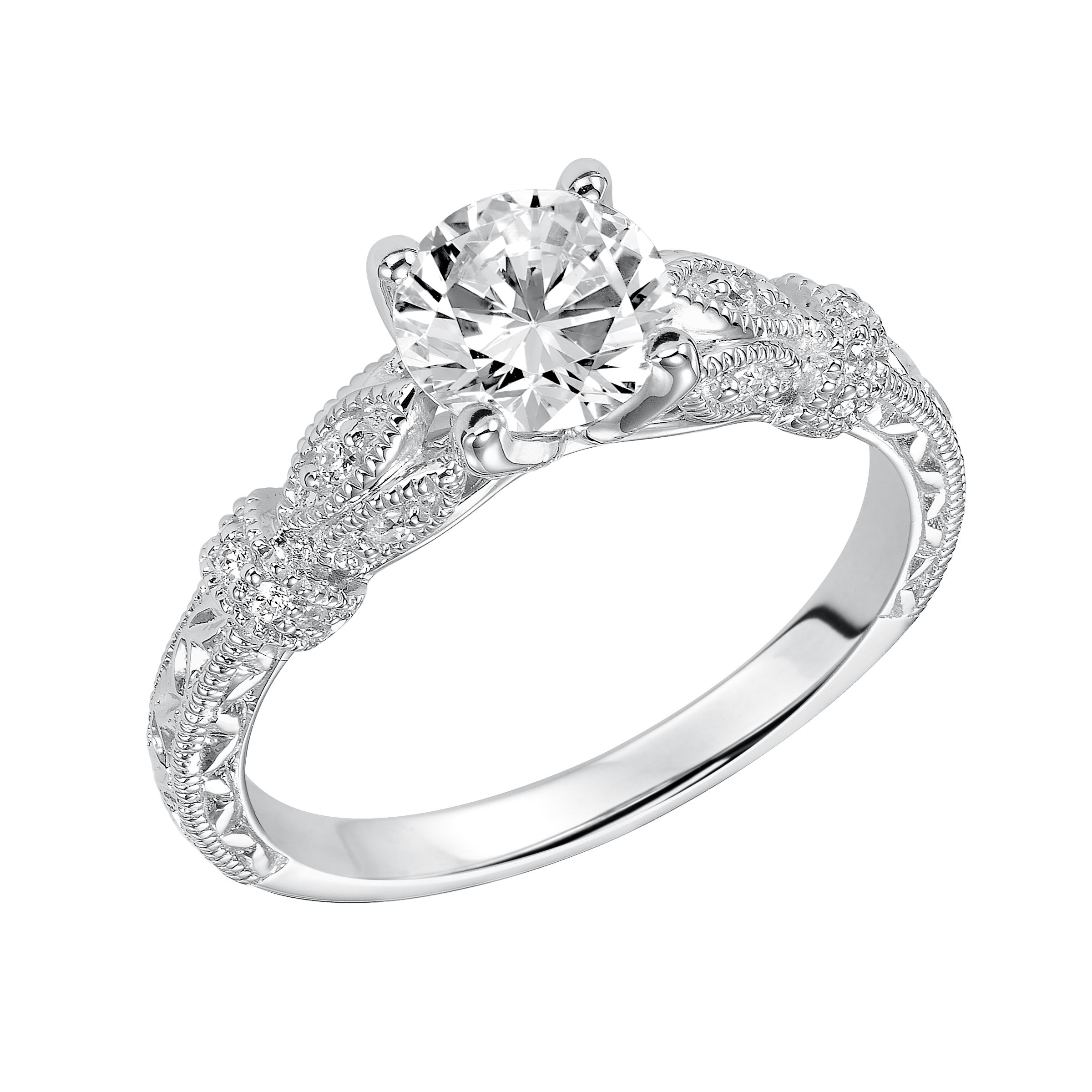 Featuring a round center diamond, this engraved and diamond prong set band with milgrain is absolutely breathtaking