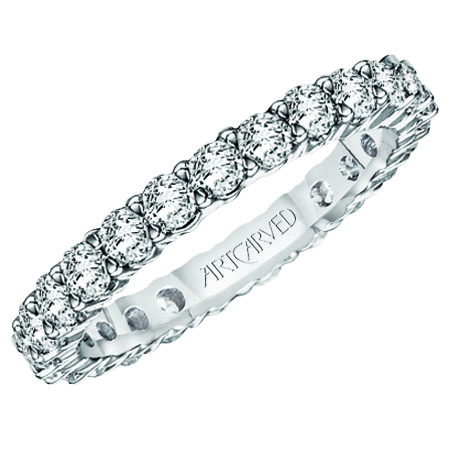 Anniversary ring with shared prong set round diamonds all around